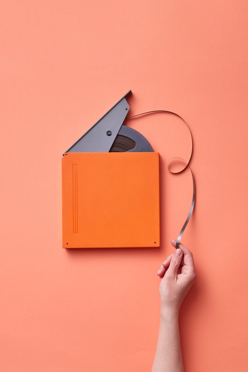 A Person Holding the Film on a Reel